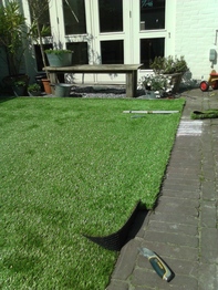 Kunstgras in achtertuin Breda
