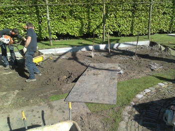 Kunstgras hockeyveld in de tuin